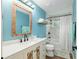 Stylish bathroom with a modern vanity and marble-tiled shower/tub at 754 Se 167Th Court Rd, Silver Springs, FL 34488