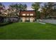 The two-story home features a charming backyard, perfect for relaxation and entertainment at 754 Se 167Th Court Rd, Silver Springs, FL 34488