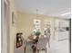 Cozy dining area features tile floors and a round table with seating for four at 8524 Sw 90Th Ln # B, Ocala, FL 34481