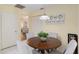 Cozy breakfast nook features bright light, tile floors, and seating for four at 8524 Sw 90Th Ln # B, Ocala, FL 34481