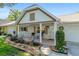 Charming home featuring a cozy front porch, well-kept landscaping, and inviting curb appeal at 8524 Sw 90Th Ln # B, Ocala, FL 34481