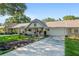 Charming home featuring a cozy front porch, well-kept landscaping, and inviting curb appeal at 8524 Sw 90Th Ln # B, Ocala, FL 34481