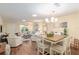 Open-concept living and dining area with lots of natural light and comfortable seating at 8524 Sw 90Th Ln # B, Ocala, FL 34481