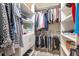 Bright walk-in closet with ample shelving, drawers, and hanging space for organized storage at 8524 Sw 90Th Ln # B, Ocala, FL 34481