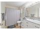 Bathroom featuring a tub and shower combo, vanity, and neutral colors at 8681 Sw 93Rd Pl # B, Ocala, FL 34481