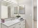 Updated bathroom with marble countertop and plenty of storage at 8681 Sw 93Rd Pl # B, Ocala, FL 34481