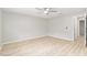 Bedroom with laminate flooring and neutral paint at 8681 Sw 93Rd Pl # B, Ocala, FL 34481