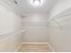 Walk-in closet with multiple shelves at 8681 Sw 93Rd Pl # B, Ocala, FL 34481