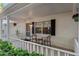 Cozy front porch with seating, perfect for enjoying a cup of coffee at 8681 Sw 93Rd Pl # B, Ocala, FL 34481