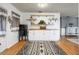 A rug lays in front of the cabinets with wooden counters and shelves at 8973 Sw 103Rd Ln, Ocala, FL 34481
