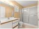 Bathroom with a single sink vanity and glass enclosed walk-in shower at 9330 Sw 84Th Ter # A, Ocala, FL 34481