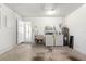 Spacious garage featuring a laundry area and utility sink for convenience at 9330 Sw 84Th Ter # A, Ocala, FL 34481