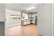 Eat-in kitchen features white cabinets and stainless steel appliances at 9330 Sw 84Th Ter # A, Ocala, FL 34481