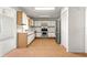 Bright kitchen featuring white cabinets and stainless steel appliances at 9330 Sw 84Th Ter # A, Ocala, FL 34481
