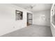 Living room showcasing white walls and new carpeting at 9330 Sw 84Th Ter # A, Ocala, FL 34481