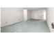 Expansive living room area features blue carpeting at 9330 Sw 84Th Ter # A, Ocala, FL 34481