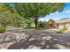 Street view of property with tree and attached garage at 9330 Sw 84Th Ter # A, Ocala, FL 34481