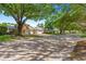 Street view of property with tree and attached garage at 9330 Sw 84Th Ter # A, Ocala, FL 34481