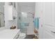 Clean bathroom showcasing glass shower and stylish baskets for storage at 9577 Sw 82Nd Street Rd, Ocala, FL 34481