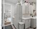 Functional laundry room with gray cabinets, sink, and a glimpse into garage at 9577 Sw 82Nd Street Rd, Ocala, FL 34481