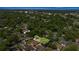 Aerial view showcases the property's location, surrounded by lush greenery at 1014 Ne 12Th St, Ocala, FL 34470