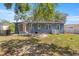 Exterior photo displaying the home's backyard and exterior features at 1014 Ne 12Th St, Ocala, FL 34470