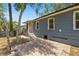 Exterior photo displaying a backyard brick patio and exterior features at 1014 Ne 12Th St, Ocala, FL 34470