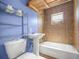 Cozy bathroom with tile and a combination shower and tub at 1014 Ne 12Th St, Ocala, FL 34470