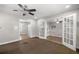 Open-concept living room with carpet, opening to other rooms at 1014 Ne 12Th St, Ocala, FL 34470