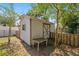Exterior photo displaying a backyard shed and exterior features at 1014 Ne 12Th St, Ocala, FL 34470