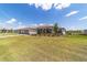 Charming one-story home featuring a brick driveway, a two-car garage, and well-manicured landscaping at 10451 Sw 98Th Place Rd, Ocala, FL 34481