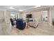Comfortable living room with stylish furnishings, bright interior, and neutral color palette at 10451 Sw 98Th Place Rd, Ocala, FL 34481