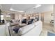 Open concept living space with a view of the kitchen and dining area, great for entertaining at 10451 Sw 98Th Place Rd, Ocala, FL 34481