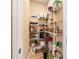 Organized pantry with wire shelving, providing ample storage space for groceries and kitchen essentials at 10451 Sw 98Th Place Rd, Ocala, FL 34481