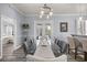 Dining room with glass table and backyard views at 1107 Se 49Th Ave, Ocala, FL 34471