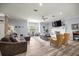 Open floor plan with a cozy seating area, modern decor, and ample natural light at 1107 Se 49Th Ave, Ocala, FL 34471