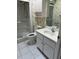 Bathroom featuring a stand up shower, toilet, and vanity with cabinets at 1325 Nw 73Rd Ter, Ocala, FL 34482