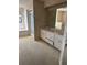 Bathroom with vanity, walk in shower, and large mirror at 1325 Nw 73Rd Ter, Ocala, FL 34482