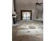 Bright open living room with fireplace and sliding door to the backyard at 1325 Nw 73Rd Ter, Ocala, FL 34482