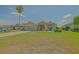 Lovely single-story home with lush green lawn and beautiful landscaping at 14004 Se 94Th Ave, Summerfield, FL 34491