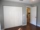 Bedroom featuring closet and hardwood flooring at 14561 Sw 112Th Cir, Dunnellon, FL 34432