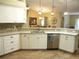 Beautiful kitchen featuring granite counters, stainless appliances, and tile backsplash at 14561 Sw 112Th Cir, Dunnellon, FL 34432