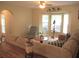 Cozy living room featuring a bay window and comfortable seating at 14561 Sw 112Th Cir, Dunnellon, FL 34432