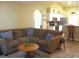 Spacious living room with an open floorplan and kitchen view at 14561 Sw 112Th Cir, Dunnellon, FL 34432