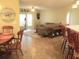 Living room featuring a bay window and an open floor plan at 14561 Sw 112Th Cir, Dunnellon, FL 34432