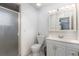 Bathroom featuring a glass shower, a white vanity, and tile flooring at 23797 Ne 189Th St, Fort Mc Coy, FL 32134