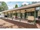 Enjoy outdoor living on the covered patio, overlooking the manicured backyard with space to grill and relax at 23797 Ne 189Th St, Fort Mc Coy, FL 32134