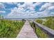 Private lake access and dock for boating, fishing, and enjoying the serene lake views at 23797 Ne 189Th St, Fort Mc Coy, FL 32134