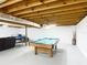 Finished basement featuring a pool table and open layout, perfect for recreation and leisure at 2580 Se 157Th Lane Rd, Summerfield, FL 34491