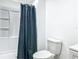 Cozy full bathroom with shower and toilet, featuring a classic and functional design at 2580 Se 157Th Lane Rd, Summerfield, FL 34491